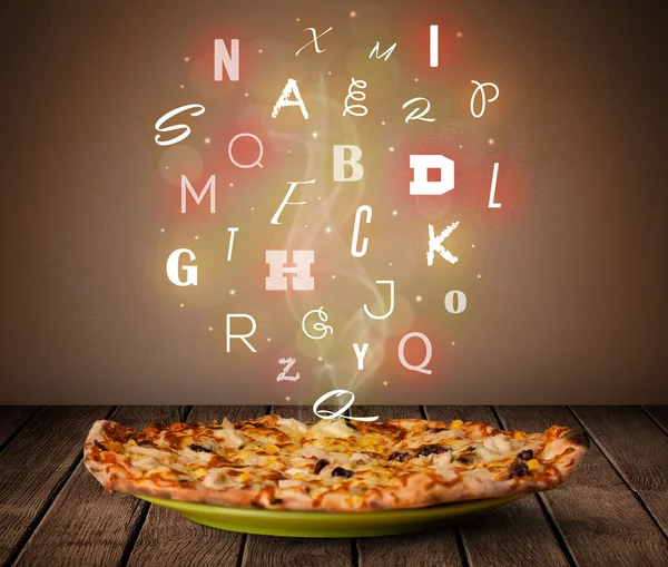 Fresh italian pizza with colorful letters on wood — Stock Photo, Image