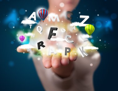 genç kadın büyülü soyut bulutlar ve balonlar konsantrasyon sunulması