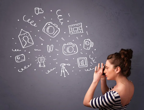 Fotógrafa chica disparando iconos de fotografía — Foto de Stock