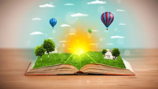 Open book with green nature world coming out of its pages — Stock Photo, Image