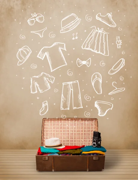 Traveler luggage with hand drawn clothes and icons — Stock Photo, Image