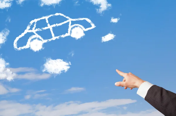 Hand pointing at car cloud on a blue sky — Stock Photo, Image