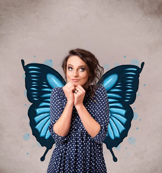 Young girl with butterfly blue illustration on the back — Stock Photo, Image