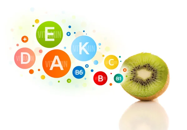 Frutas saudáveis com símbolos coloridos de vitaminas e ícones — Fotografia de Stock
