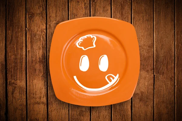 Happy smiley visage de dessin animé sur plaque de plat coloré — Photo