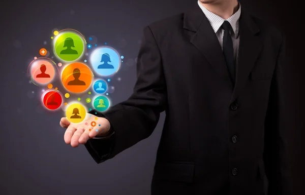 Social network icons in the hand of a businessman — Stock Photo, Image