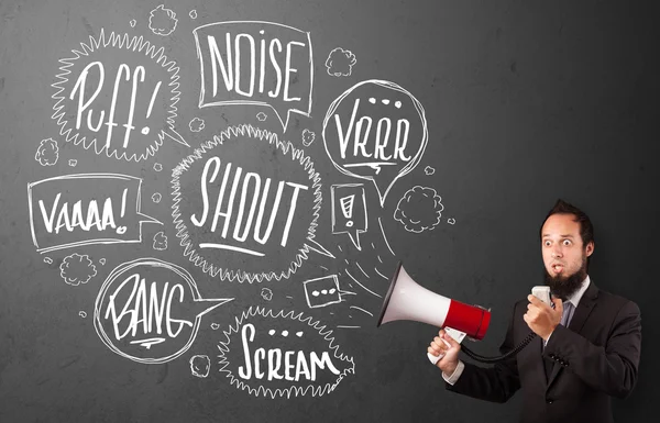Cara de terno gritando em megafone e bolhas de fala desenhadas à mão — Fotografia de Stock
