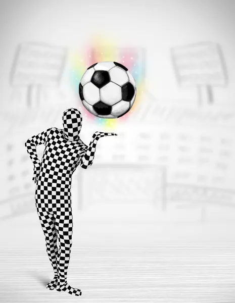 Man in full body suit holdig soccer ball — Stock Photo, Image