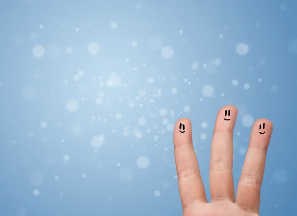 Happy Finger Smileys mit leerem blauen Bokeh Hintergrund — Stockfoto