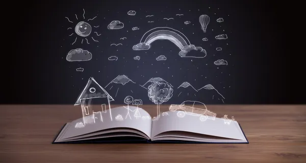 Open book with hand drawn landscape — Stock Photo, Image