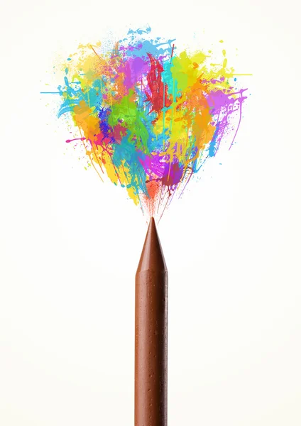 Colored paint splashes coming out of crayon — Stock Photo, Image