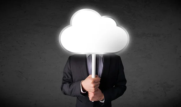 Biznesmen trzymający chmurę — Zdjęcie stockowe