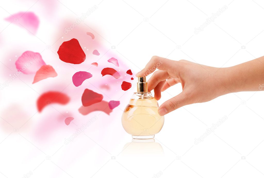 woman hands spraying rose petals