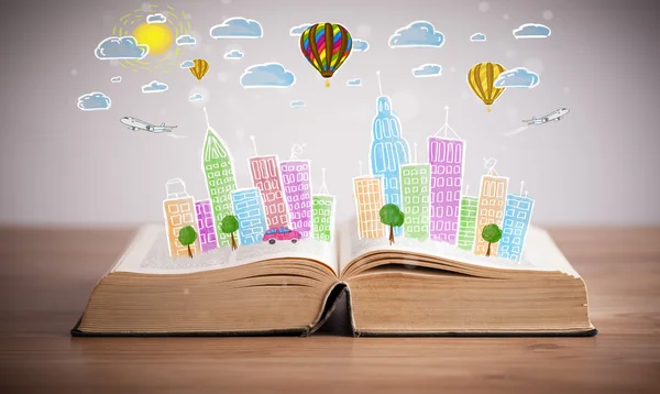 Cityscape drawing on open book — Stock Photo, Image