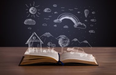 Elle çizilmiş peyzaj ile açık kitap