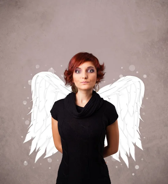 Cute person with angel illustrated wings on grungy background — Stock Photo, Image