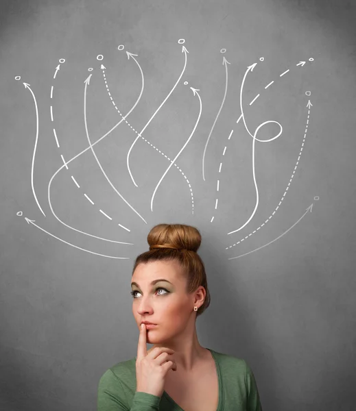 Young woman with arrows coming out of her head — Stock Photo, Image