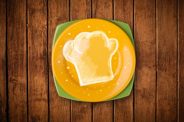 Barevný talíř s ručně kresleným bílým symbolem šéfkuchaře — Stock fotografie