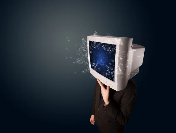 Computer monitor screen exploding on a young persons head — Stock Photo, Image