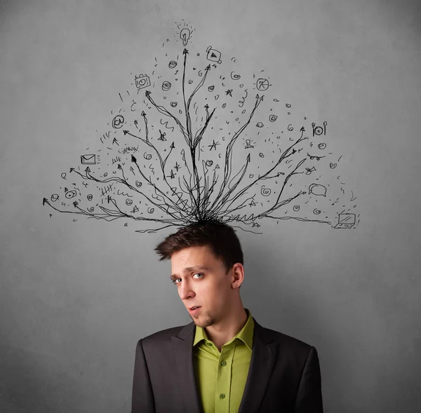 Businessman with tangled lines coming out of his head — ストック写真