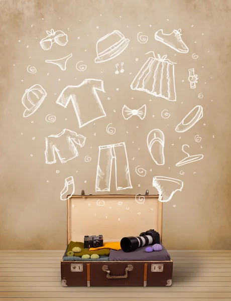 Traveler luggage with hand drawn clothes and icons — Stock Photo, Image