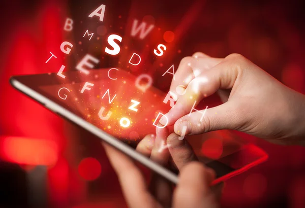 Finger pointing on tablet pc, letters concept — Stock Photo, Image