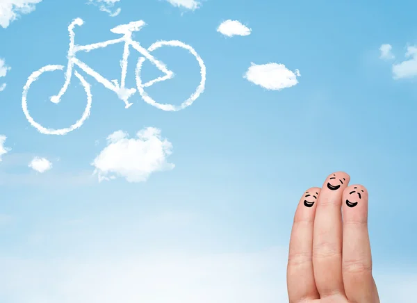 Felices dedos sonrientes mirando una nube en forma de bicicleta — Foto de Stock