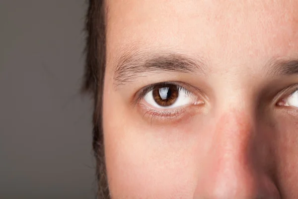 Portrait of a handsome man close up eye — Stock Photo, Image