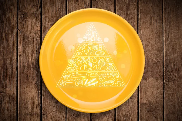 Pyramide alimentaire dessinée à la main sur une assiette colorée — Photo