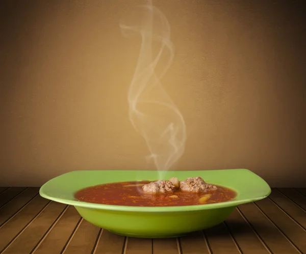 Fresh delicious home cooked soup with steam — Stock Photo, Image