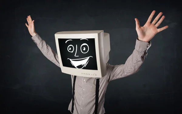 Hombre de negocios feliz con una cabeza de monitor de PC y una cara sonriente —  Fotos de Stock