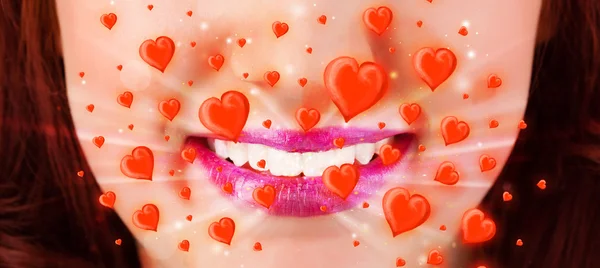 Pretty lady lips with lovely red hearts — Stock Photo, Image