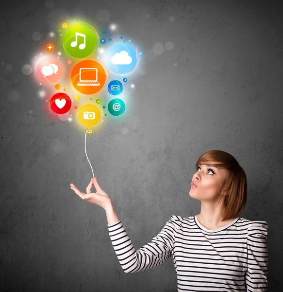 Woman holding social media balloon — Stock Photo, Image