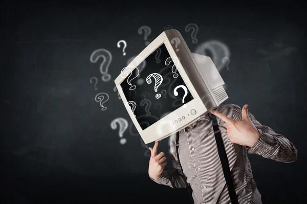 コンピュータモニターの頭と質問のマークを持つビジネスマン — ストック写真