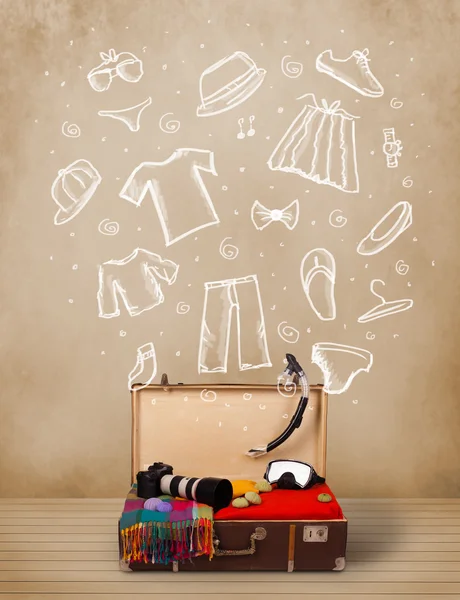 Traveler luggage with hand drawn clothes and icons — Stock Photo, Image