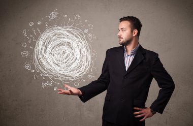 Bir iş adamının elinde kaos kavramı