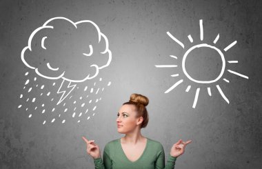 bir güneş ve yağmur çizme arasında duran kadın