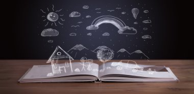 Elle çizilmiş peyzaj ile açık kitap