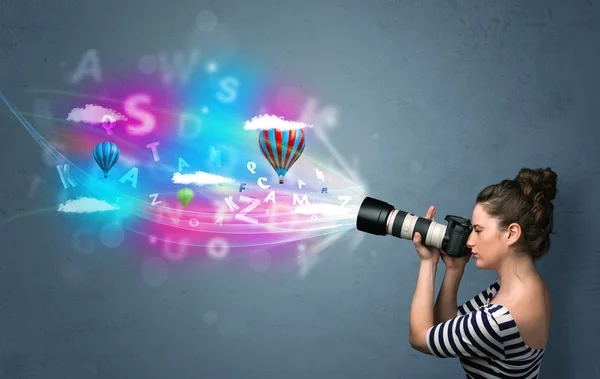 Photographer with camera and abstract imaginary — Stock Photo, Image