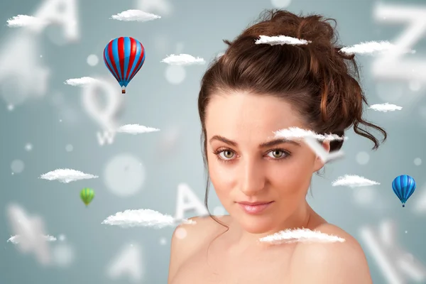 Beautiful young woman with wellness and healthcare clouds — Stock Photo, Image