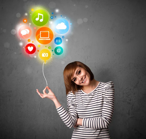 Woman holding social media balloon — Stock Photo, Image