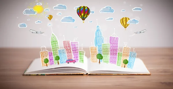 Cityscape drawing on open book — Stock Photo, Image