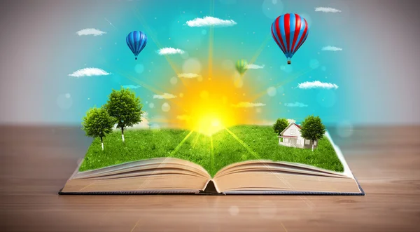 Open book with green nature world coming out of its pages — Stock Photo, Image