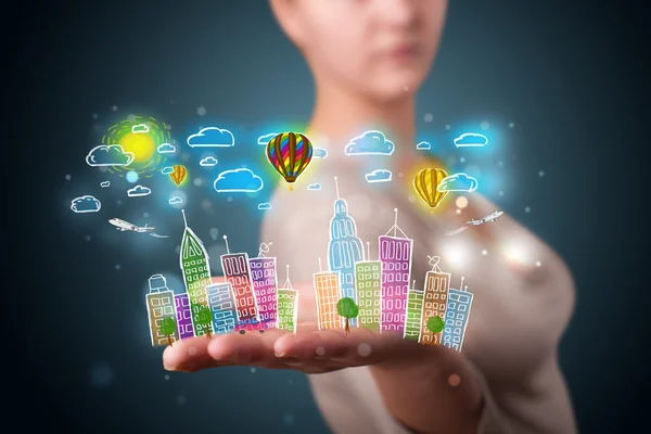 Young woman presenting colorful hand drawn metropolitan city — Stock Photo, Image