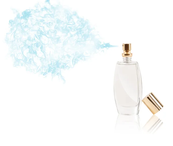 Perfume bottle spraying colored scent — Stock Photo, Image