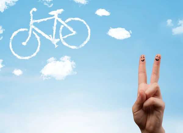 Happy smiley fingers looking at a bicycle shapeed cloud — Stock Photo, Image