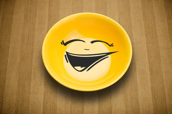Щасливий смайлик мультфільм обличчя на барвистій тарілці — стокове фото