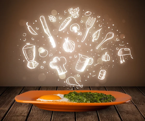 Plate of food with white kitchen icons — Stock Photo, Image