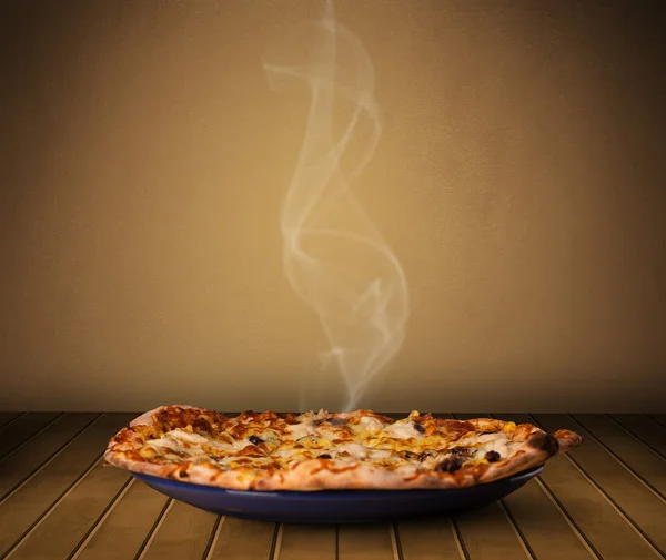 Fresh delicious home cooked pizza with steam — Stock Photo, Image