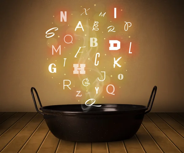 Leuchtende Buchstaben aus Kochtopf — Stockfoto